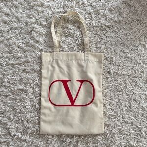 Valentino Beige Tote with Bold Red Emblem